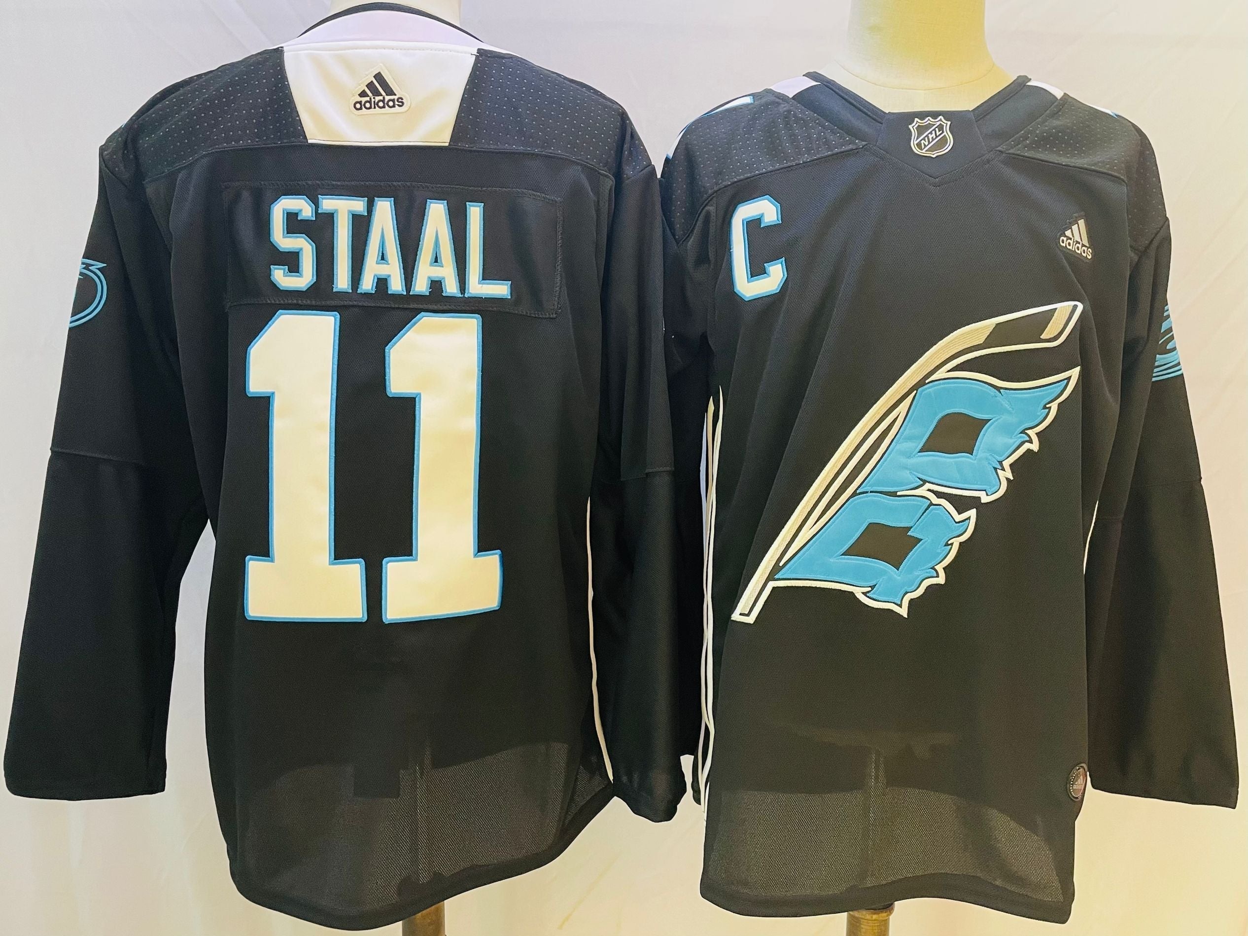 Men's Carolina Hurricanes Jordan Staal #11 Black Home Breakaway Player Jerseys
