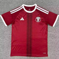 2026/27 Qatar Home Red Fans Soccer Jersey Front