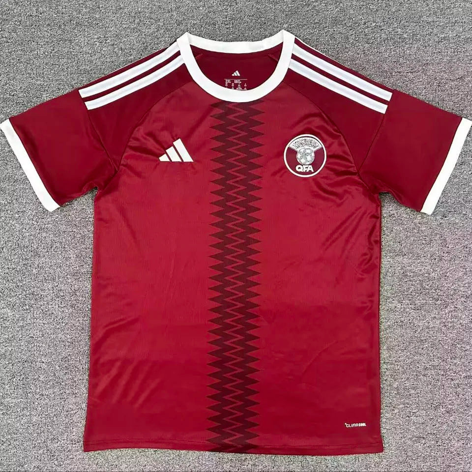 2026/27 Qatar Home Red Fans Soccer Jersey Front