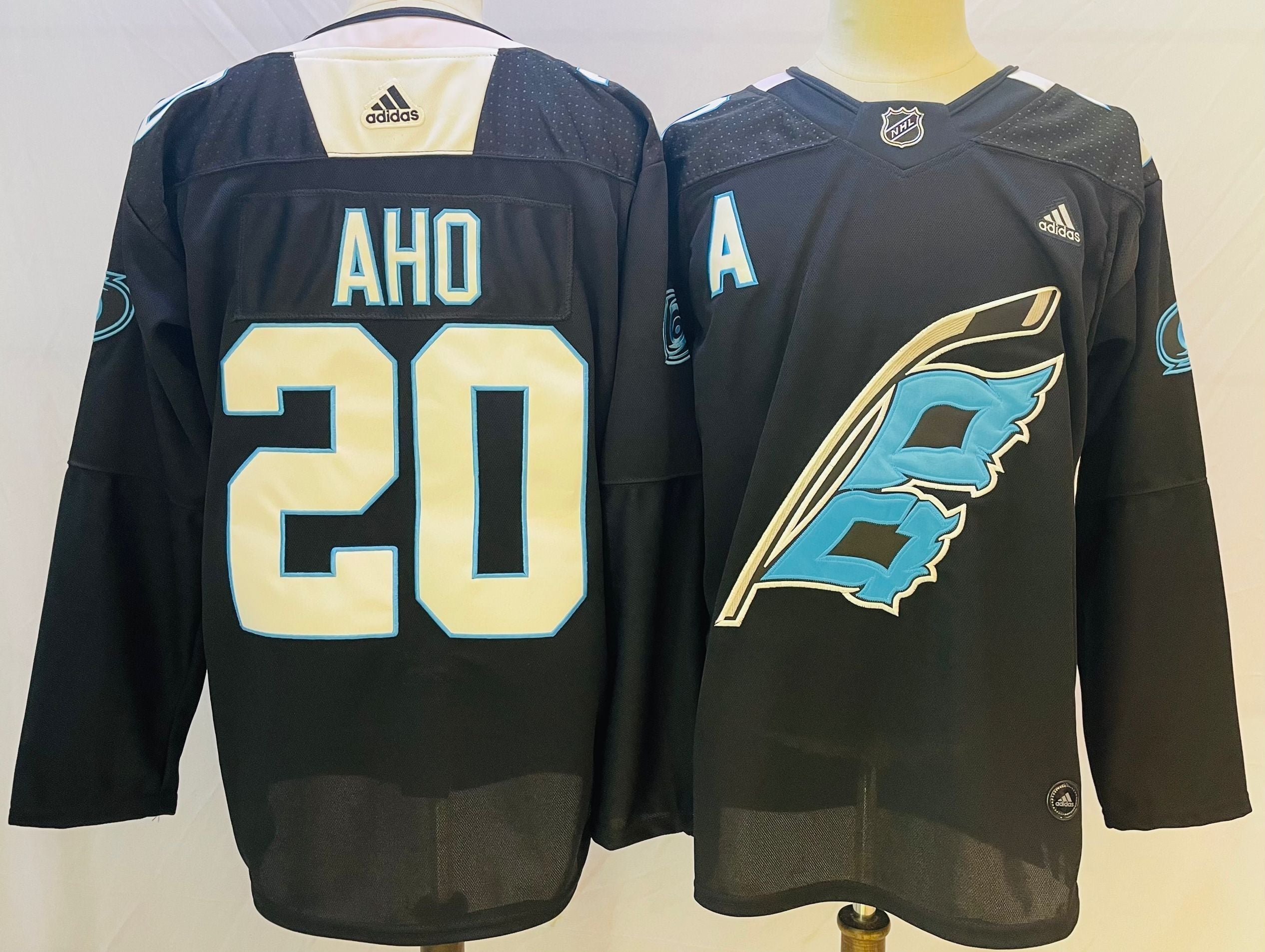 Men's Carolina Hurricanes Sebastian Aho #20 Black Player Jerseys