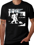 Bigfoot Shoveling Snow Graphic Tee