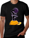Astronaut on Saturn Graphic T-Shirt - Space Explorer